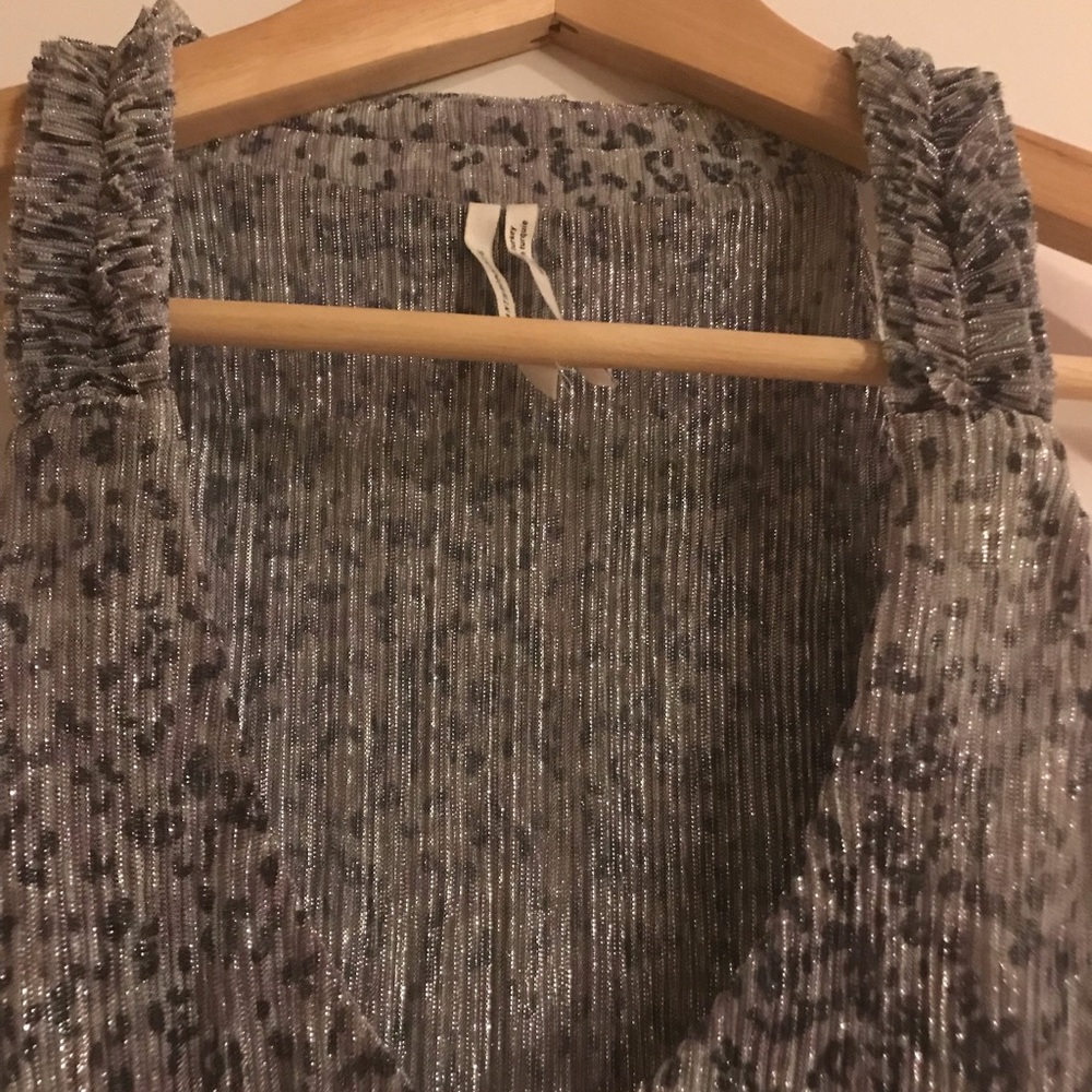Shimmering Anthropology Top. Perfect for holidays.